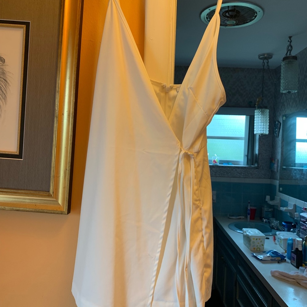 White romper with tags